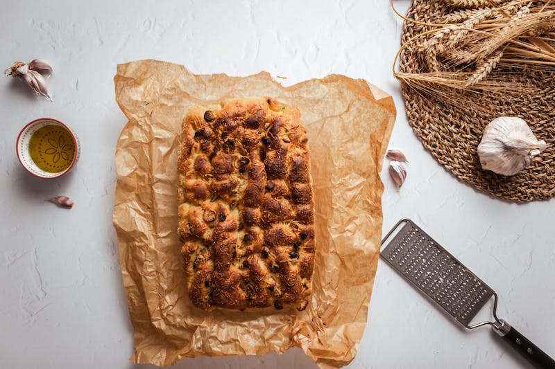 Soft garlic knots with herb butter and parmesan