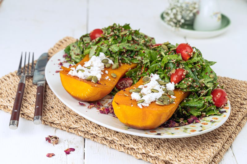 Seasonal harvest salad with roasted squash and pumpkin seeds