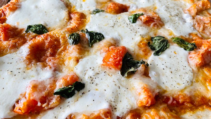 Classic Margherita pizza with fresh mozzarella and basil